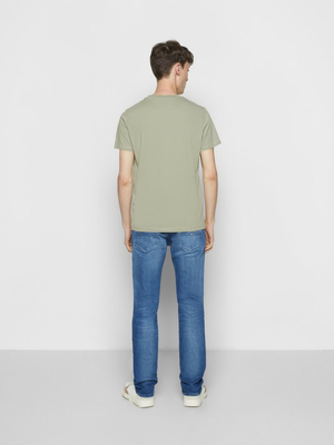 Tommy Jeans pánske svetlo zelené tričko CHEST LOGO - S (PMI)