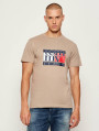 detail Tommy Jeans pánske svetlo hnedé tričko