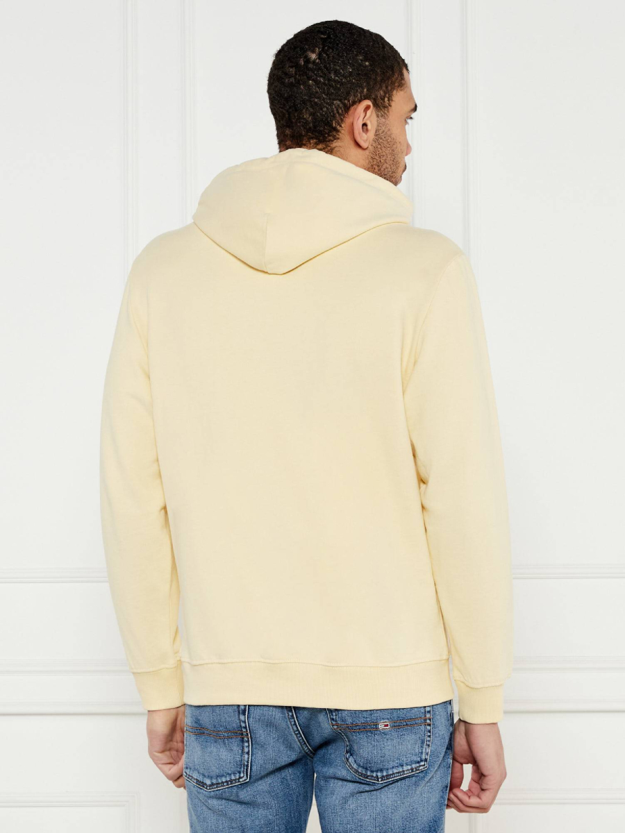 detail Tommy Jeans pánska žltá mikina