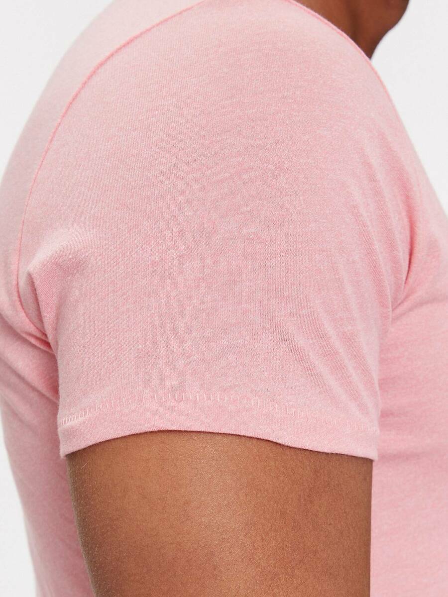 detail Tommy Jeans pánske ružové tričko
