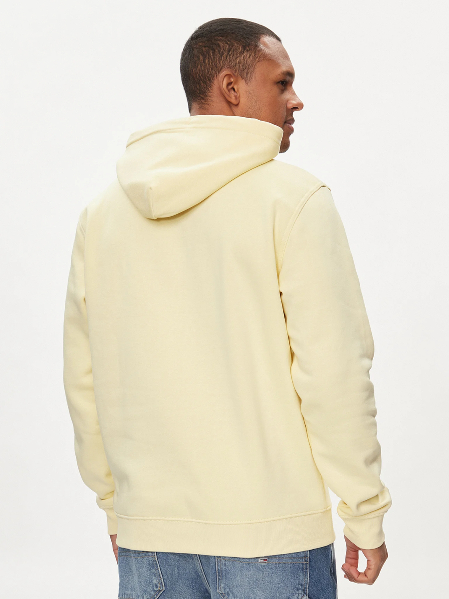 detail Tommy Jeans pánska žltá mikina