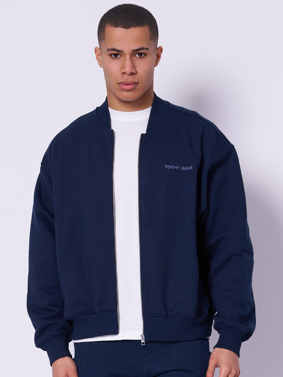 detail Tommy Jeans pánska modrá mikina