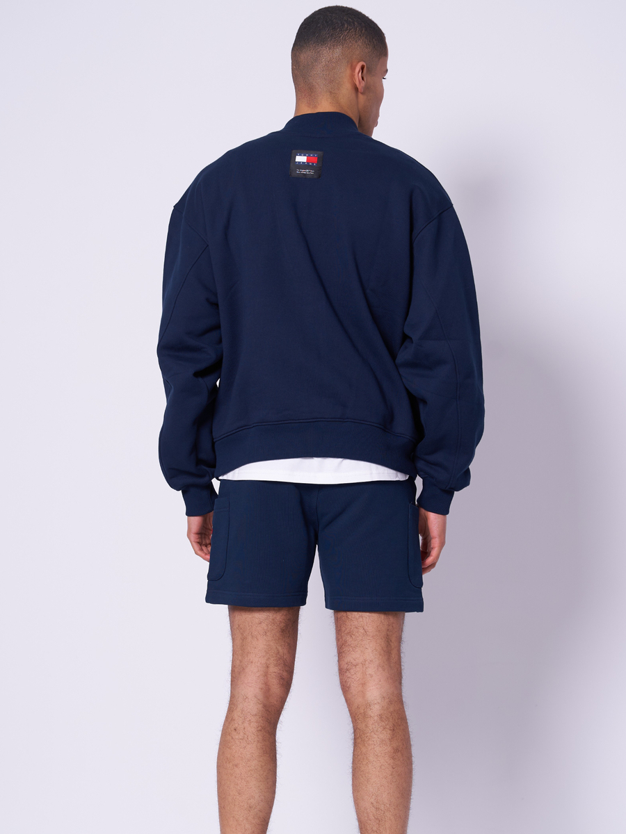 detail Tommy Jeans pánska modrá mikina