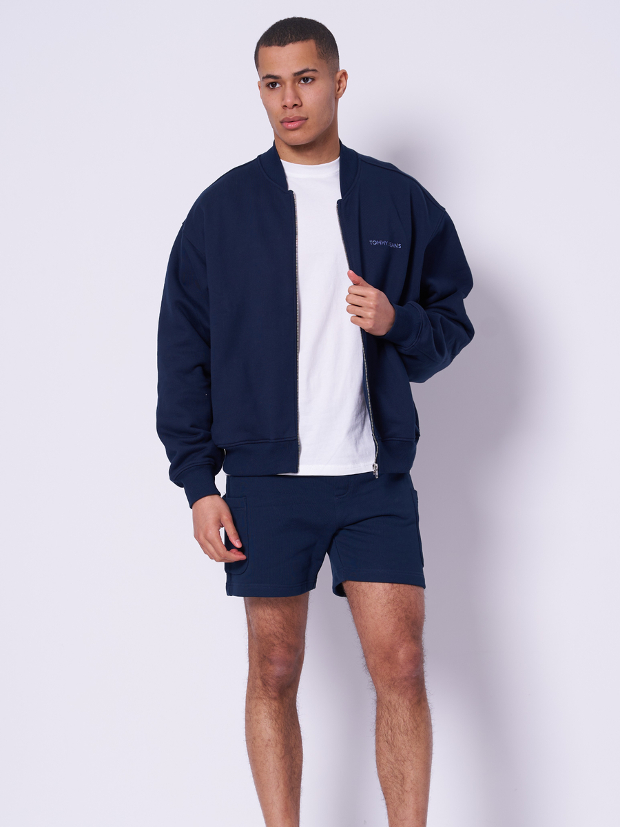 detail Tommy Jeans pánska modrá mikina