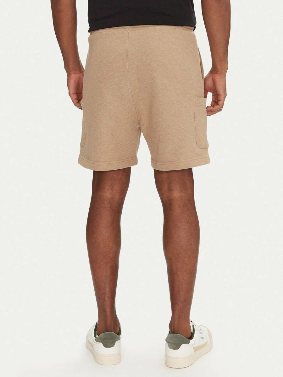 detail Tommy Jeans pánske béžové šortky