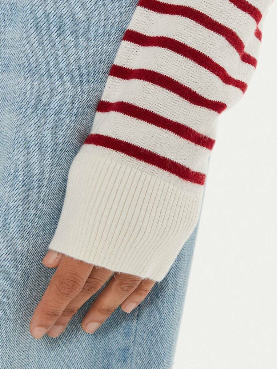 detail Tommy Jeans dámsky pruhovaný svetrík
