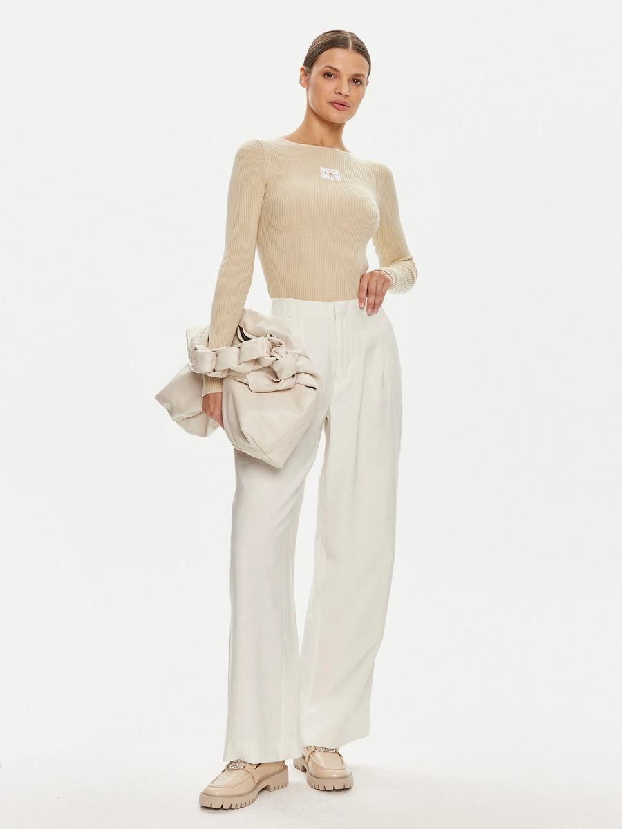 detail Calvin Klein dámske béžové nohavice