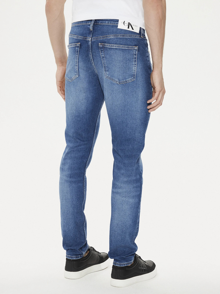 detail Calvin Klein pánske modré džínsy