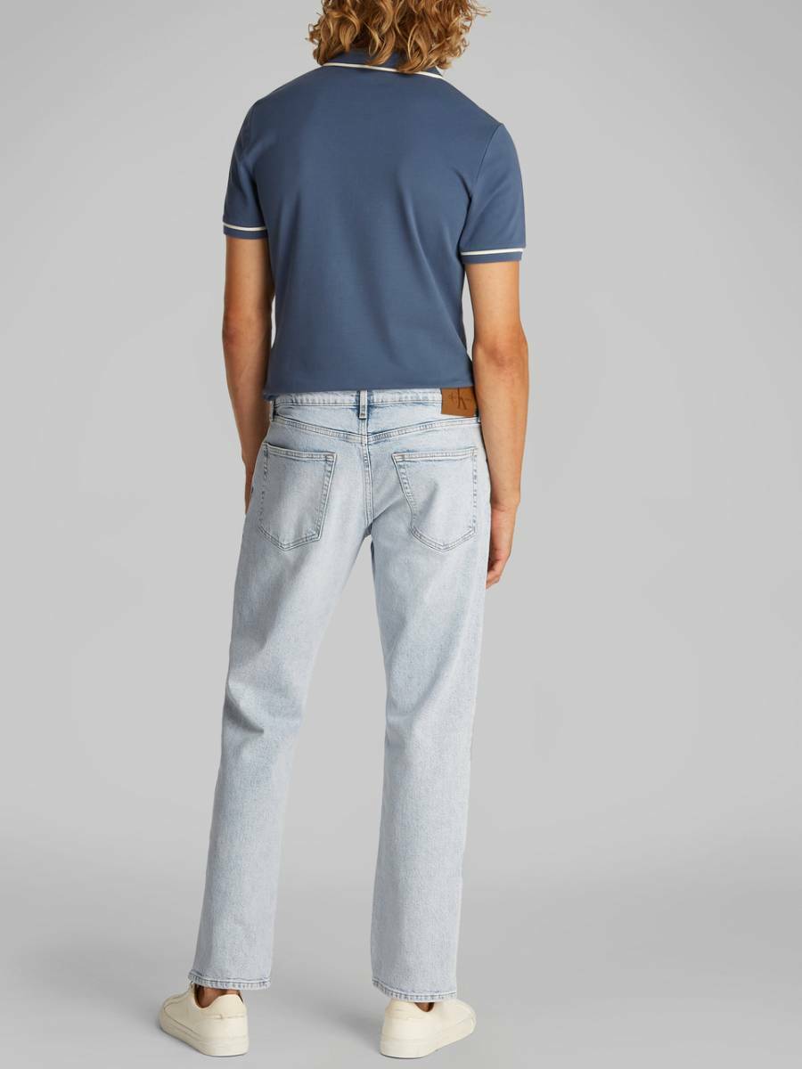 detail Calvin Klein pánske svetlo modré džínsy