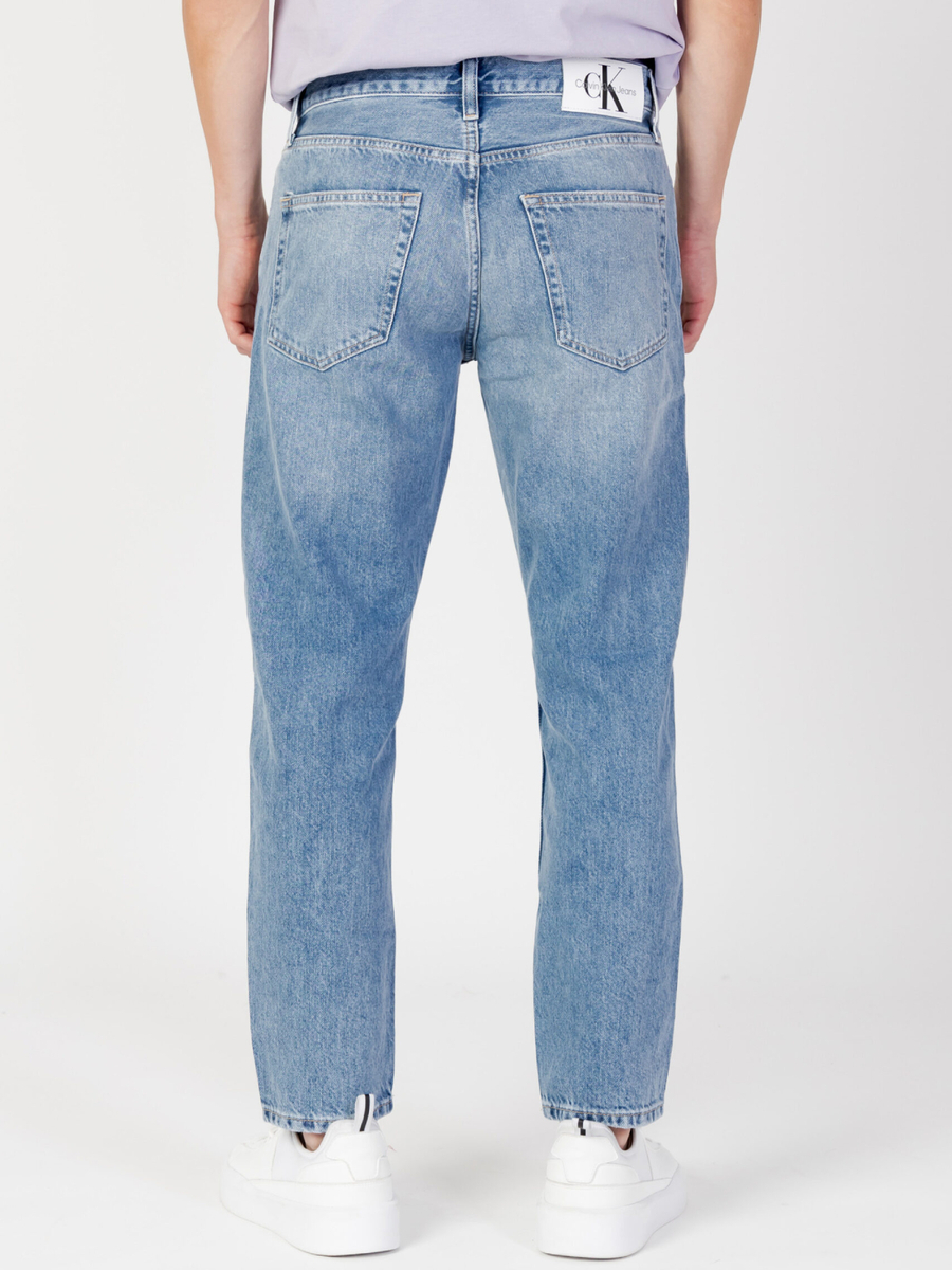 detail Calvin Klein pánske svetlo modré džínsy