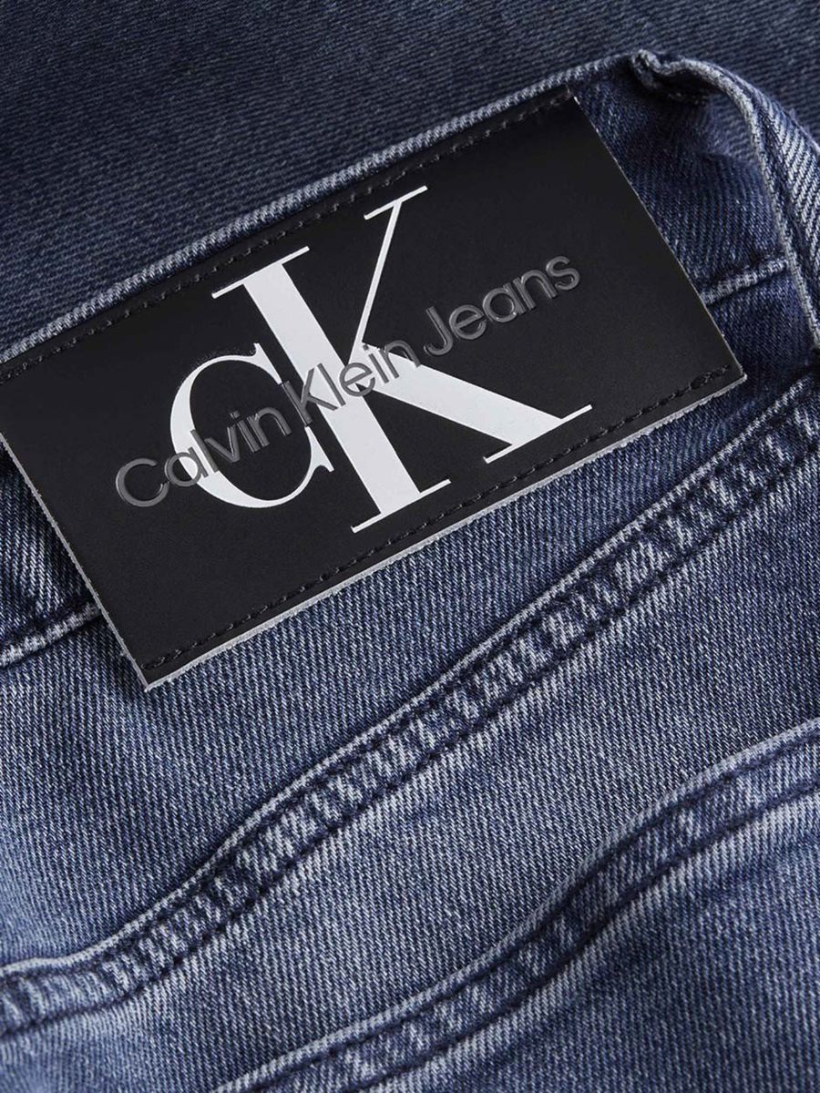 detail Calvin Klein pánske modré džínsy Slim Taper