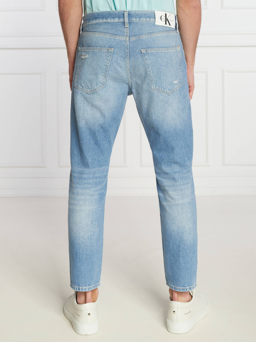 detail Calvin Klein pánske modré džínsy 