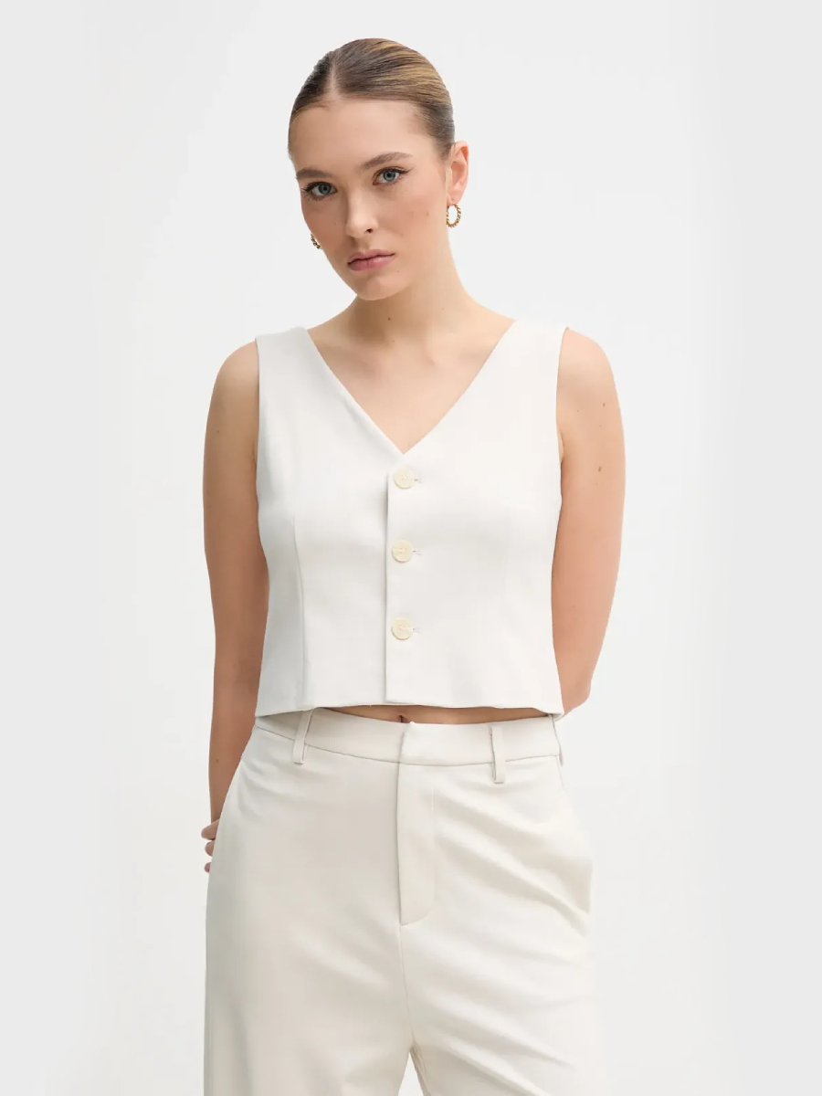 detail Calvin Klein dámska béžová vesta