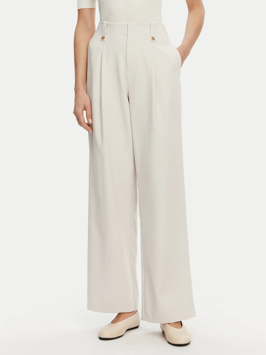 detail Calvin Klein dámske béžové nohavice