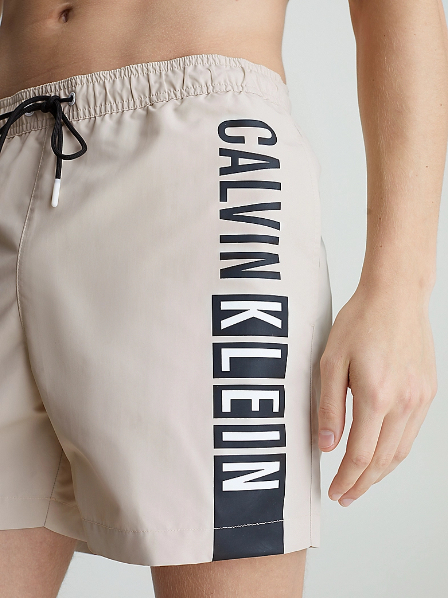 detail Calvin Klein pánske béžové plavky