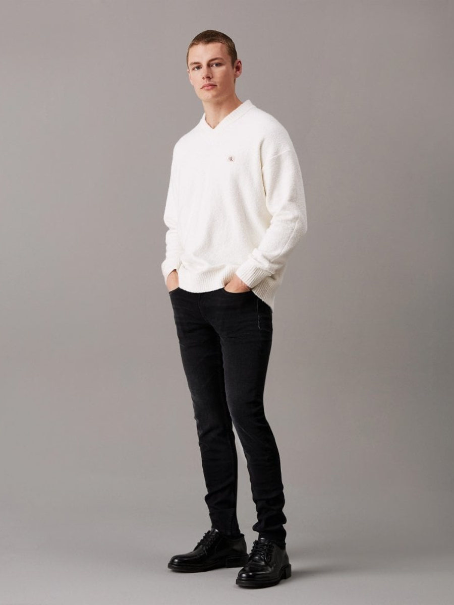 detail Calvin Klein pánske čierne džínsy