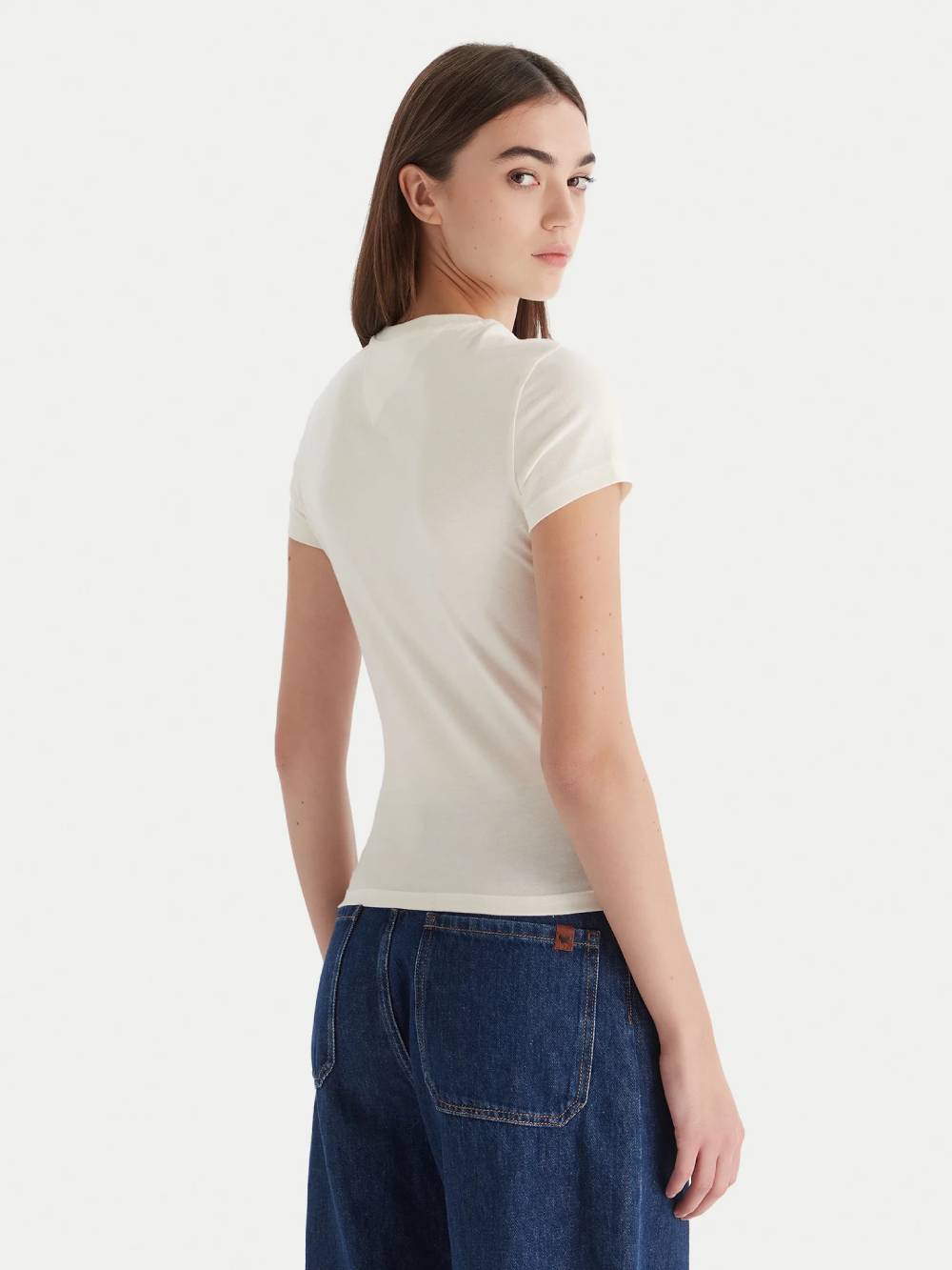 detail Tommy Jeans dámske krémové tričko