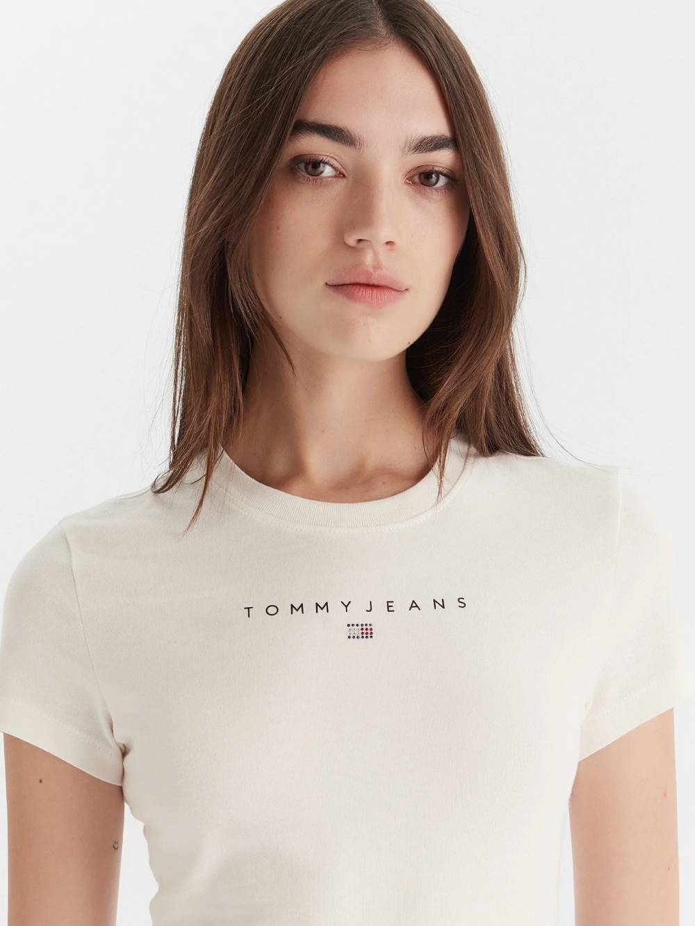detail Tommy Jeans dámske krémové tričko