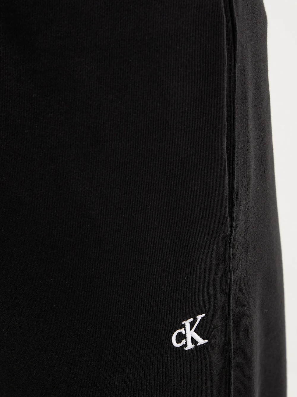 detail Calvin Klein pánske čierne tepláky