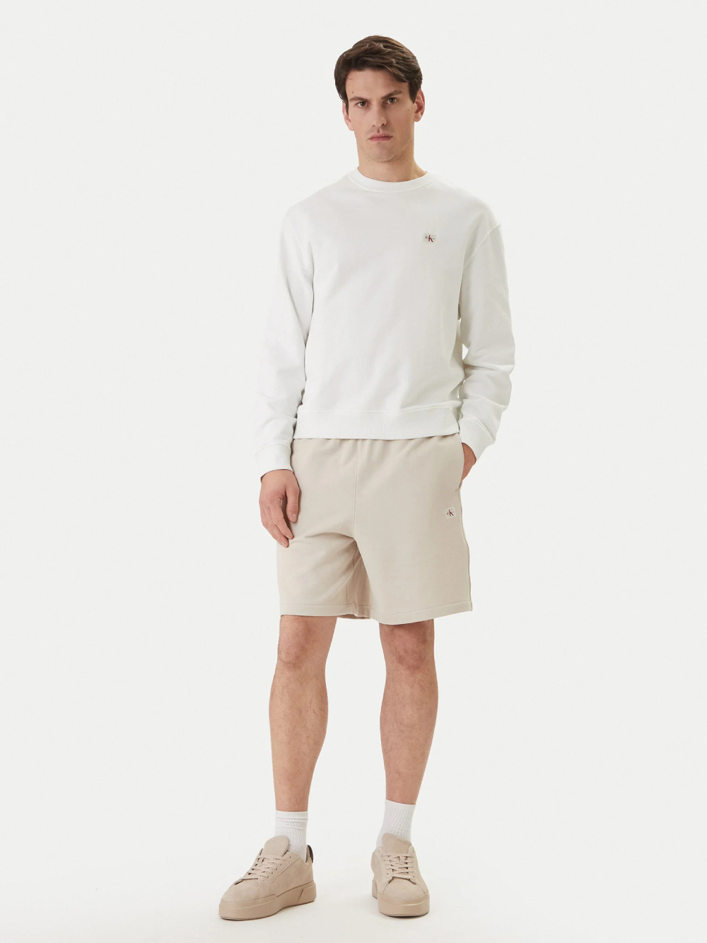 detail Calvin Klein pánske béžové šortky