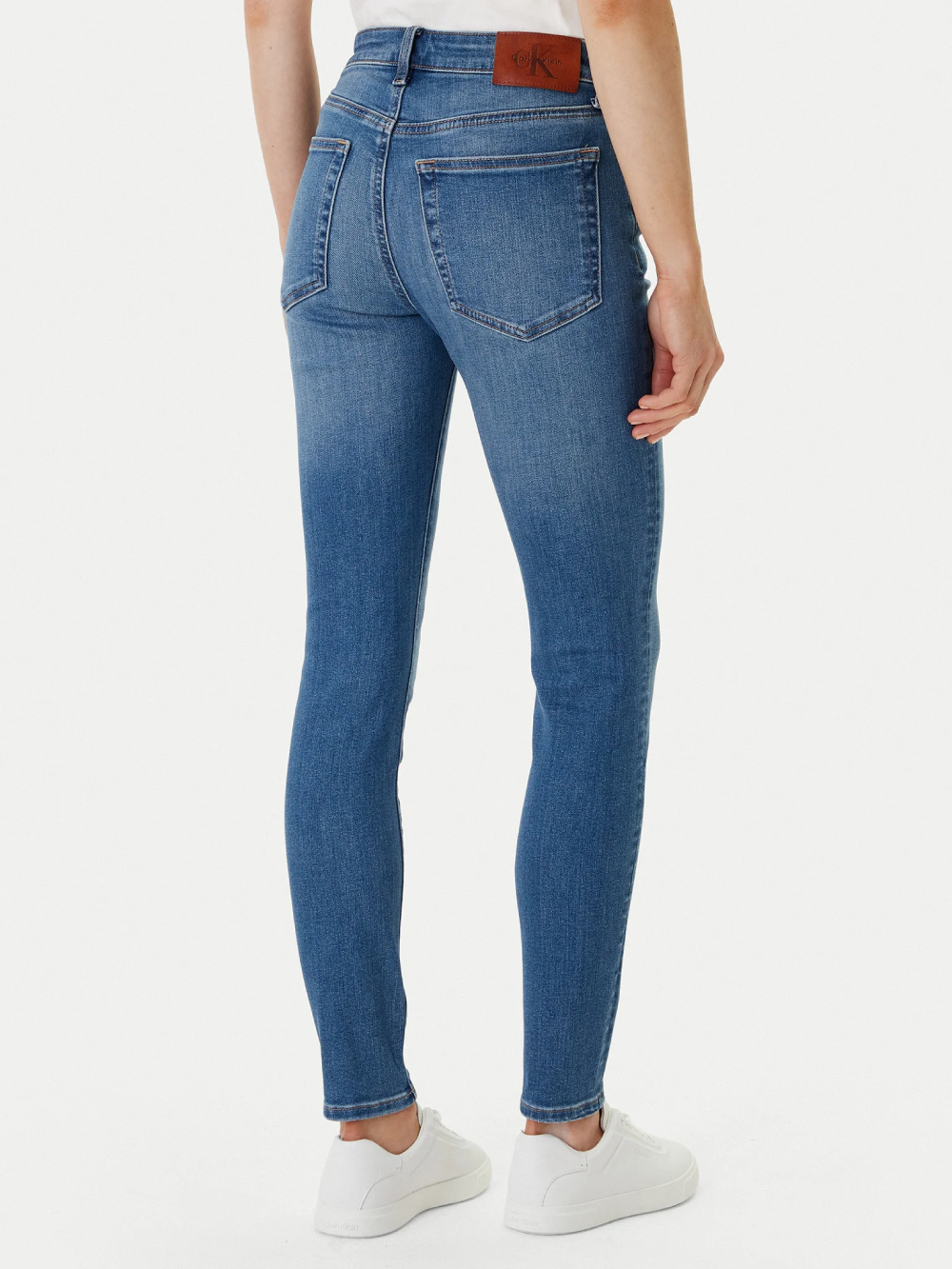 detail Calvin Klein dámske modré skinny džínsy