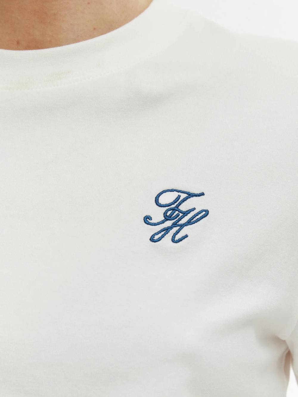 detail Tommy Hilfiger dámske biele tričko