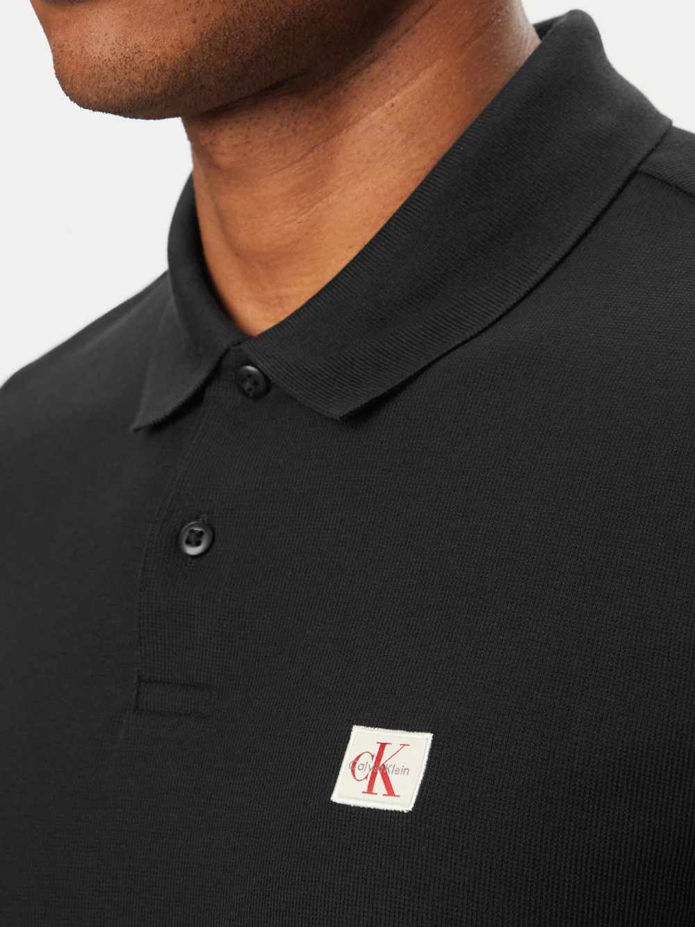 detail Calvin Klein pánske čierne polo tričko