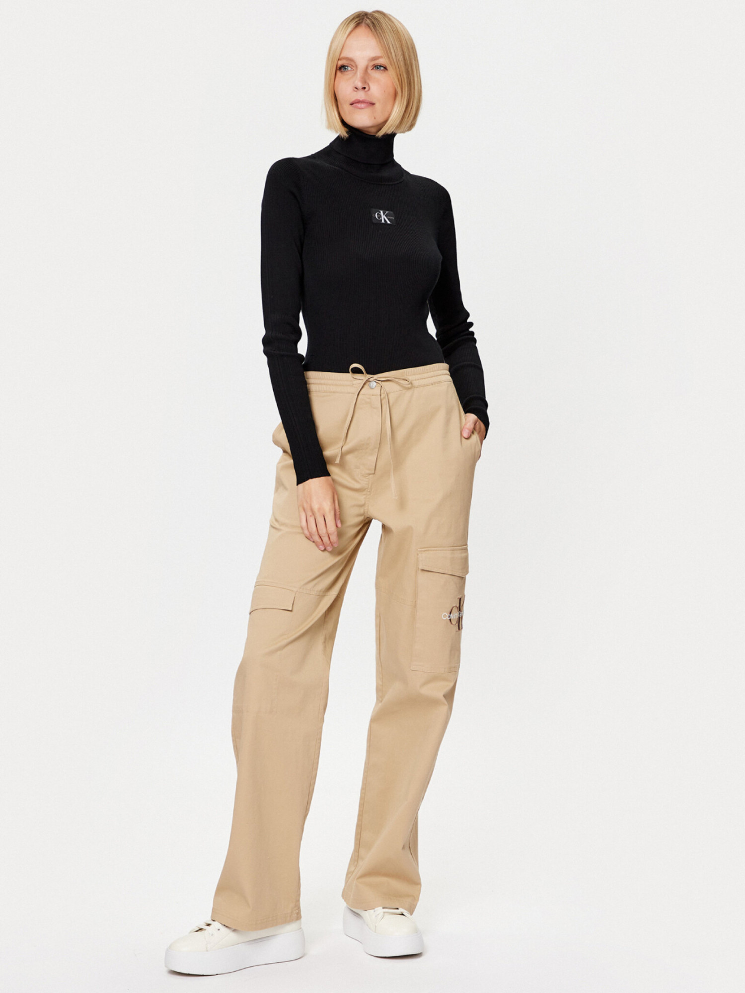 detail Calvin Klein dámsky oranžový rolák