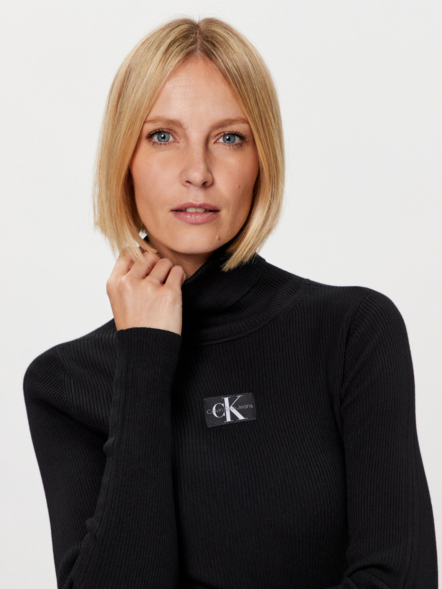 detail Calvin Klein dámsky oranžový rolák