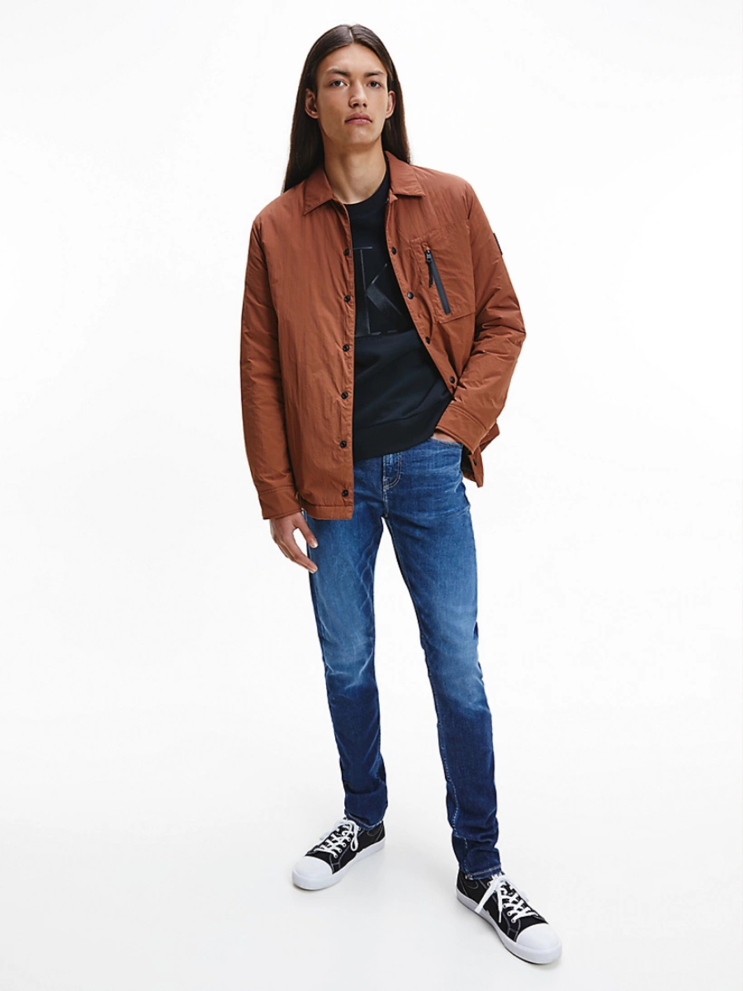 detail Calvin Klein pánske modré džínsy Taper