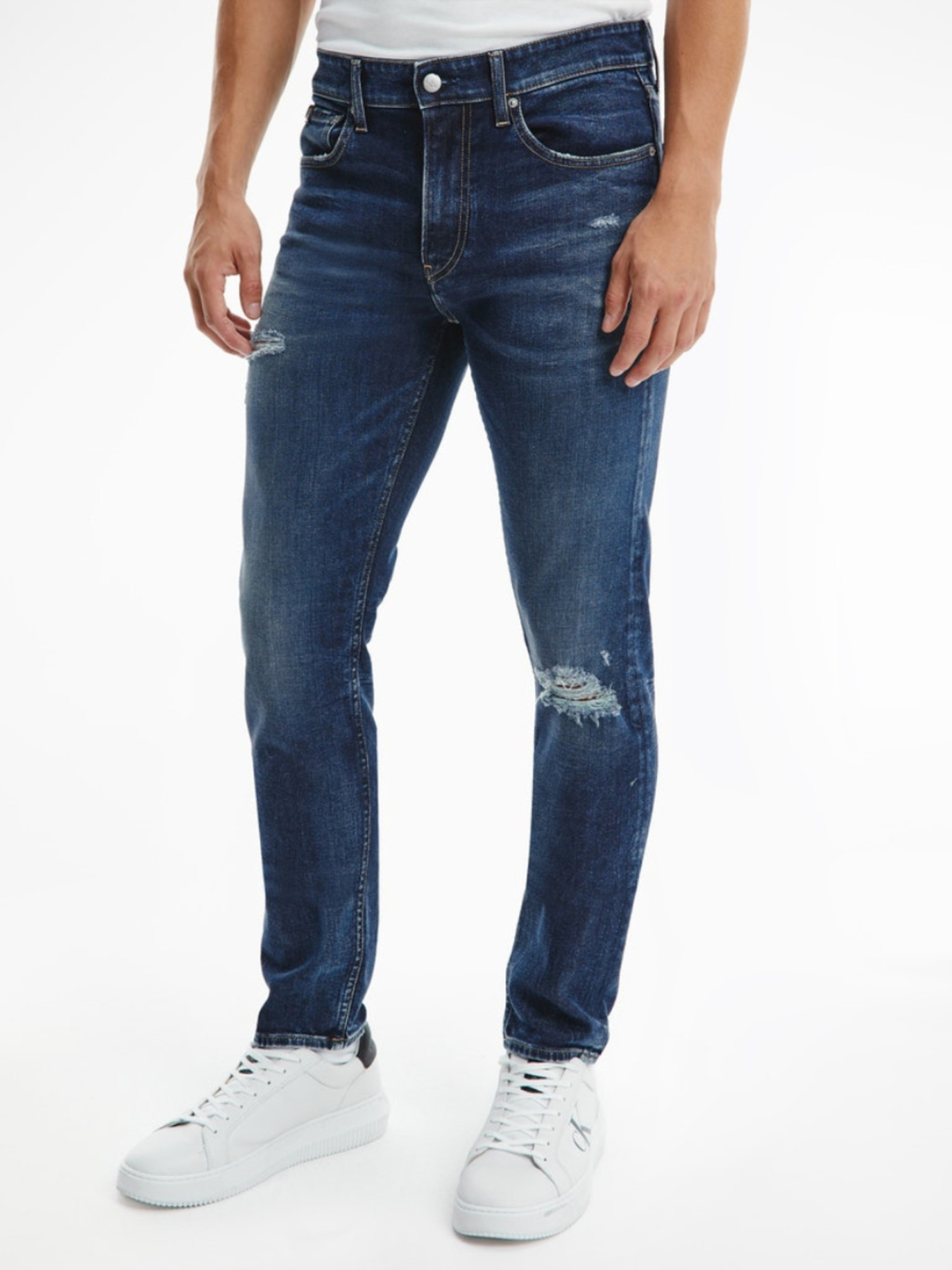 detail Calvin Klein pánske modré džínsy