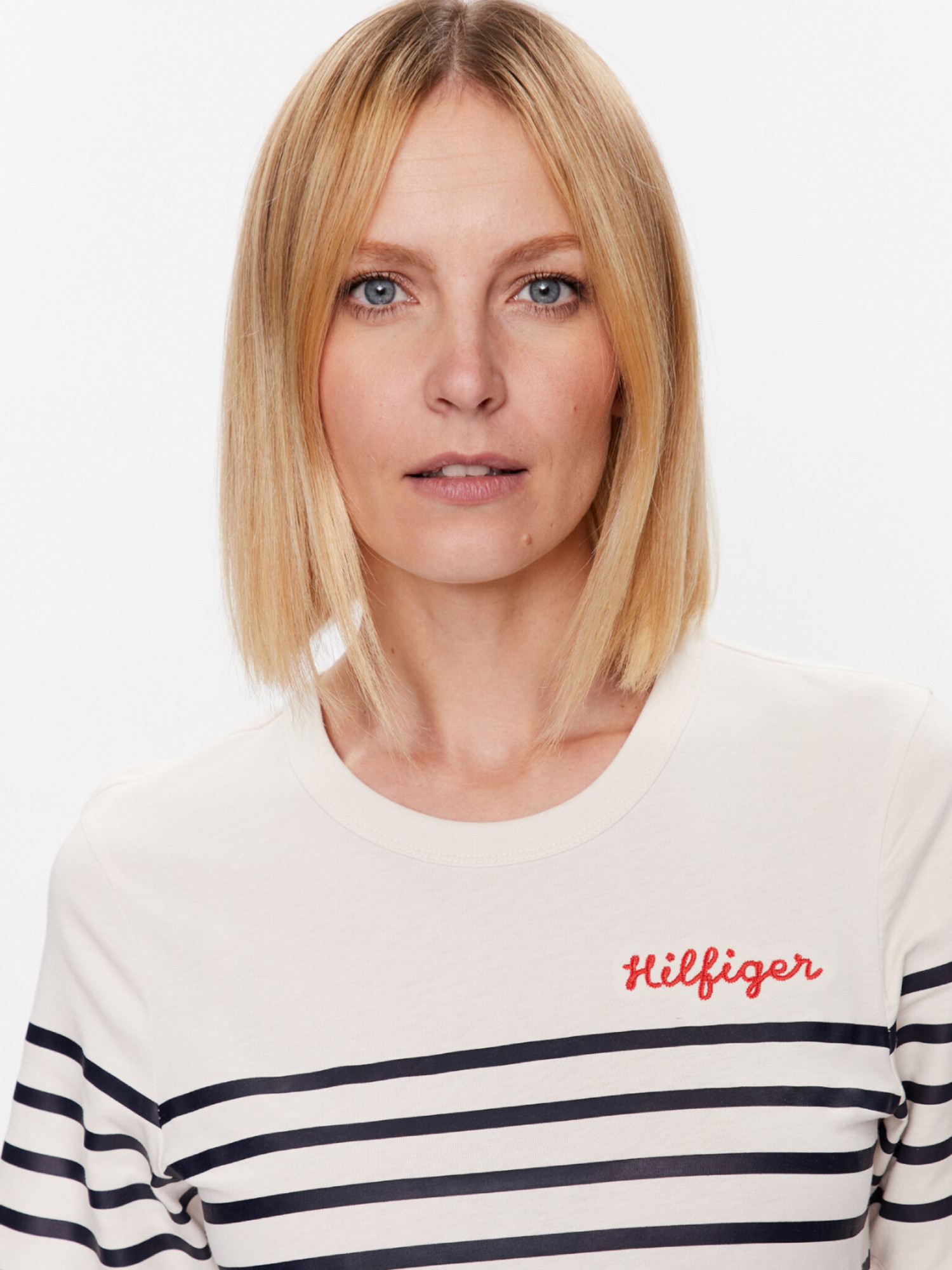 detail Tommy Hilfiger dámske krémové šaty