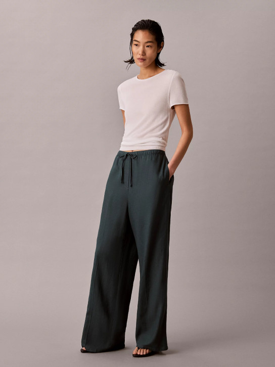 Calvin Klein dámske modrozelené nohavice